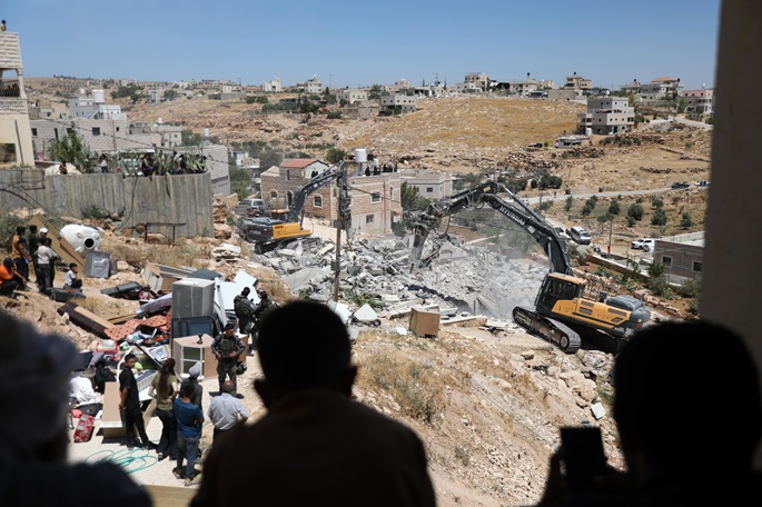 EU arvostelee Israelin tuoreita Länsirannan asutustoimia. 1